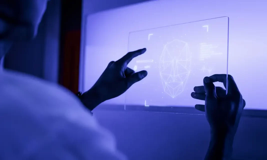 a foto mostra a mão de uma pessoa mexendo em uma tela digital - inteligência artificial